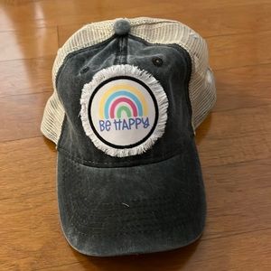 Trucker Hat with faded black bill and “Be Happy” patch